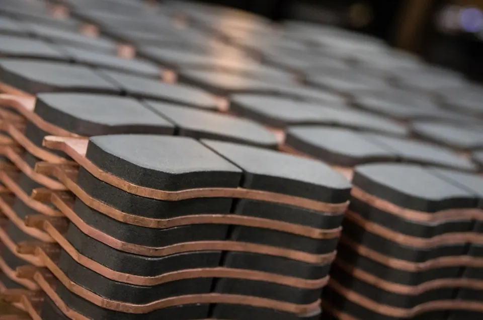 Copper-backed friction pads